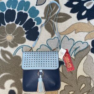 Carlos Santana crossbody adjustable purse.